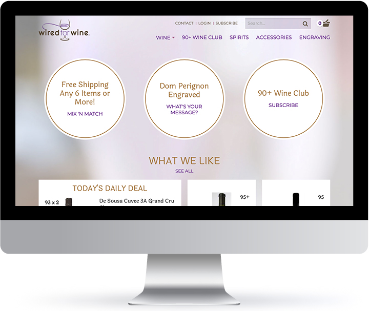 Wired for Wine homepage displaying navigation menu, promotional offers for free shipping and wine club subscription, and a daily deal section featuring Dom Perignon wine.